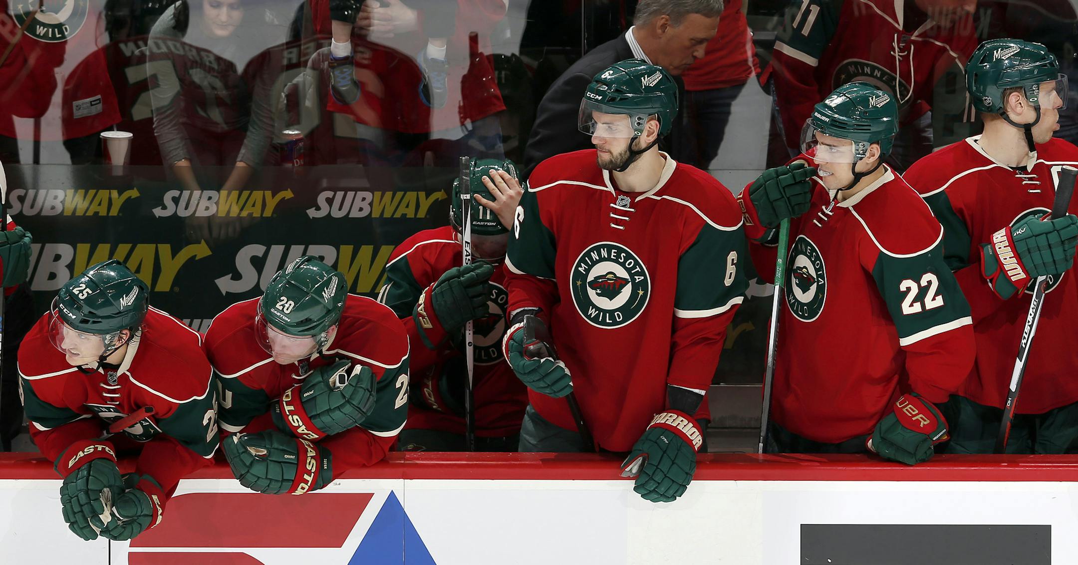 Wild players watched as the Coyotes won a shootout Monday night at the Xcel Energy Center.