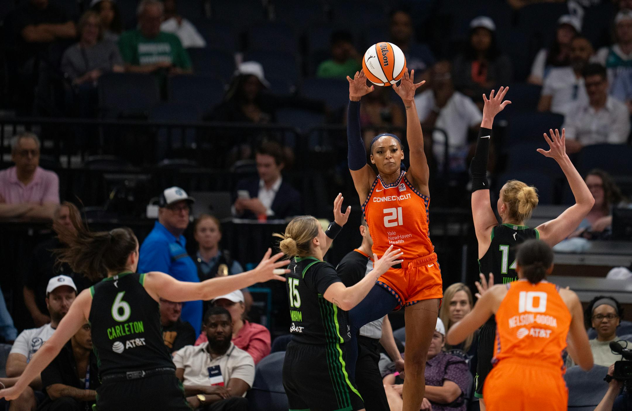 Connecticut Sun guard DiJonai Carrington (21) passed off to Connecticut Sun forward Olivia Nelson-Ododa (10) in the fourth quarter Thursday night. The Minnesota Lynx lost to the Connecticut Sun 89-68 in a WNBA game Thursday night, June 22, 2023 at Target Center in Minneapolis.