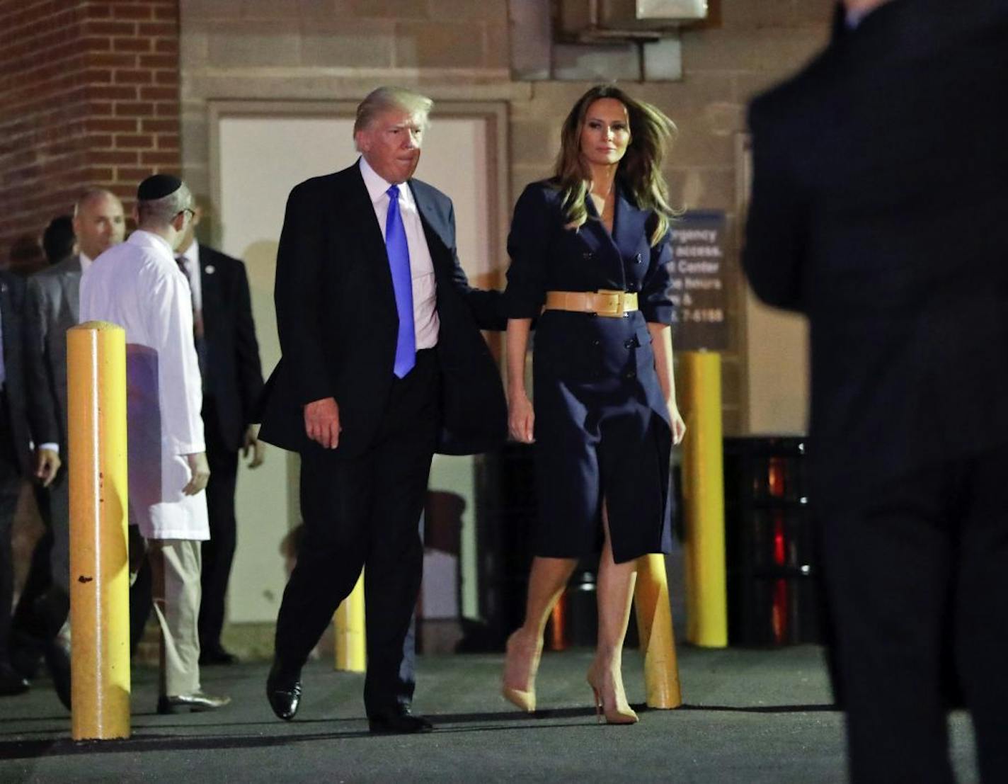 President Donald Trump and first lady Melania Trump walk to their vehicle after visiting MedStar Washington Hospital Center in Washington, Wednesday, June 14, 2017, where House Majority Leader Steve Scalise of La. was taken after being shot in Alexandria, Va., during a Congressional baseball practice.