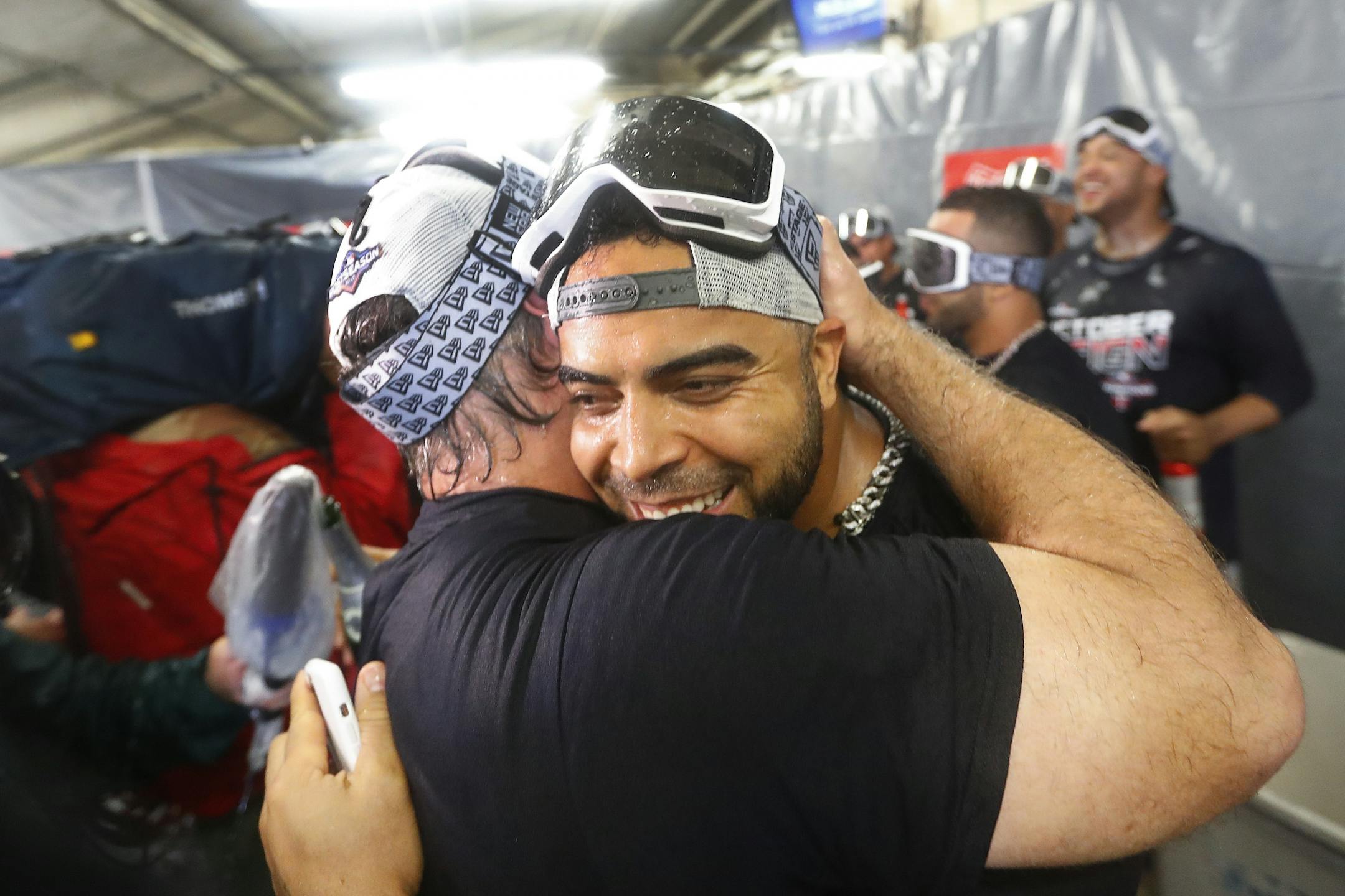 Minnesota Twins' Nelson Cruz celebrates with teammates after the Twins clinched the AL Central on Wednesday, Sept. 25, 2019, in Detroit. The Twins defeated the Detroit Tigers 5-1 in a baseball game, and later clinched when the Cleveland Indians lost to the Chicago White Sox.