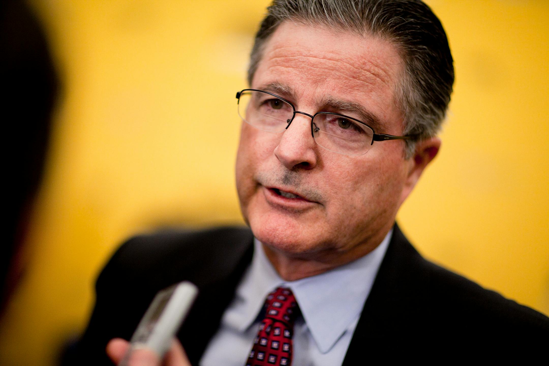 John Watson, chairman and chief executive officer of Chevron Corp., speaks to the media following an interview at the American Petroleum Institute energy jobs summit on Capitol Hill in Washington, D.C., U.S., on Wednesday, Sept. 7, 2011. Watson said President Barack Obama shouldn't use government subsidies to create jobs, and instead should cut regulations to lower unemployment. Photographer: Andrew Harrer/Bloomberg *** Local Caption *** John Watson
