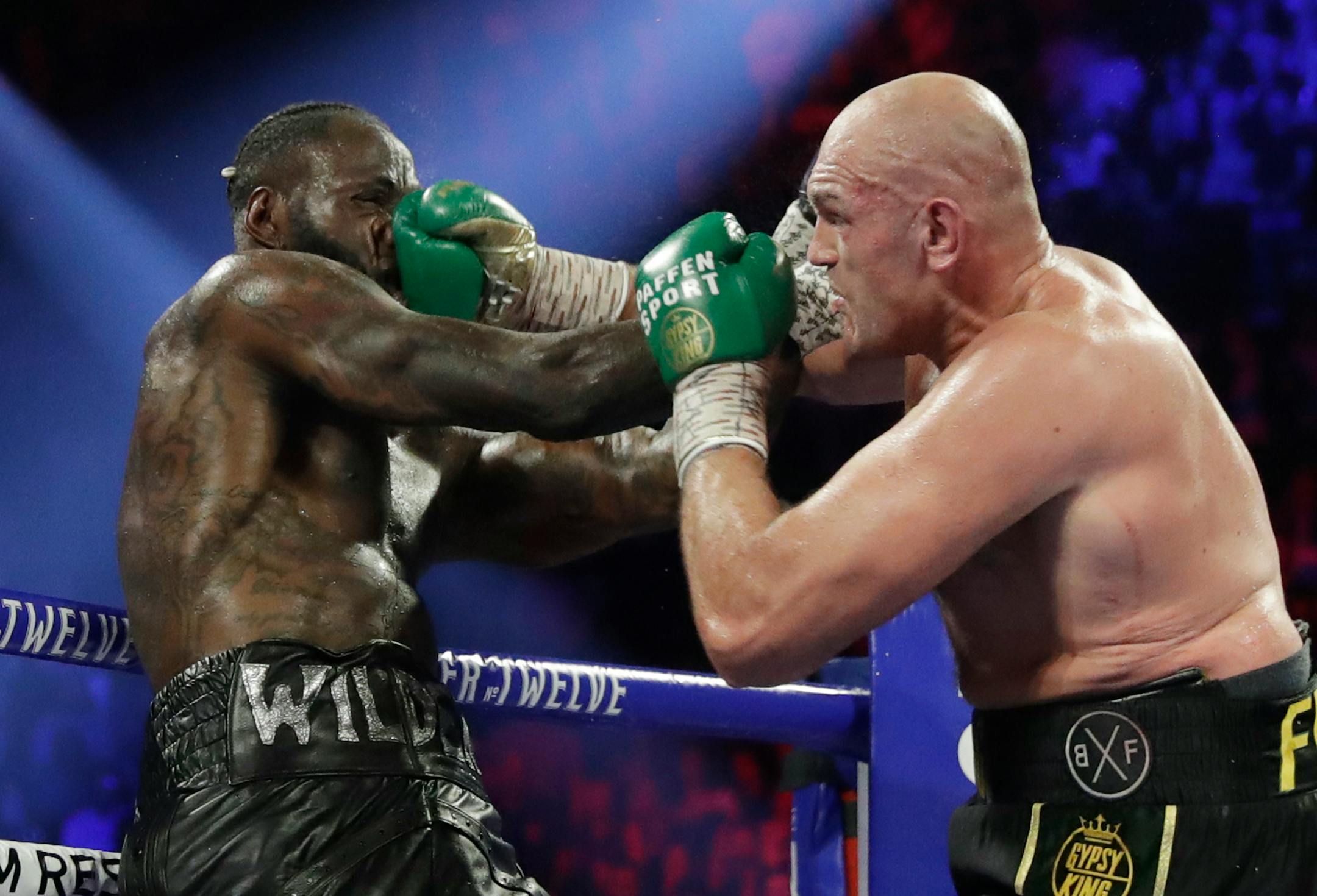 Tyson Fury, of England, lands a right to Deontay Wilder during a WBC heavyweight championship boxing match Saturday, Feb. 22, 2020, in Las Vegas.