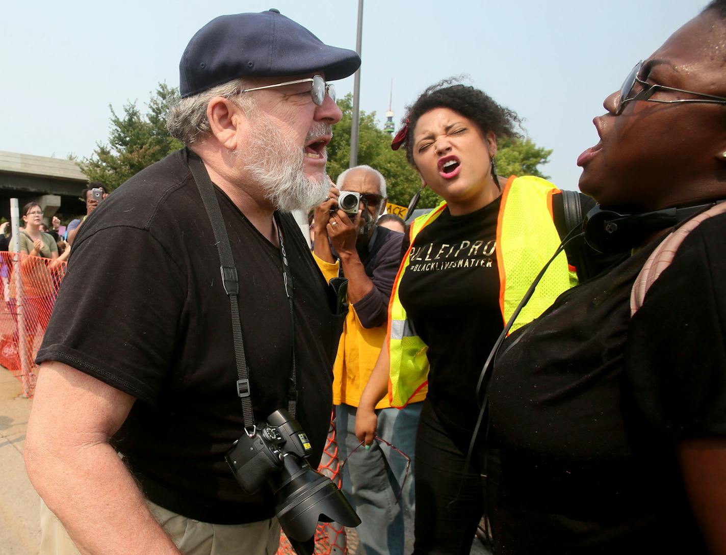 Black Lives Matter Minnesota vows to disrupt the State Fair's first Saturday by assembling at Hamline Park and marching to the Minnesota State Fairgrounds entrance Saturday, Aug. 29, 2015, in St. Paul. Here, a man who gave a last name of Whiskey, engages in a yelling match with two Black Lives Matter protestors near Snelling and Como. As the Black Lives Matter protestors yelled: "Shut it down," referring to the State Fair, the man yelled: "Shut up."](DAVID JOLES/STARTRIBUNE)djoles@startribune.co