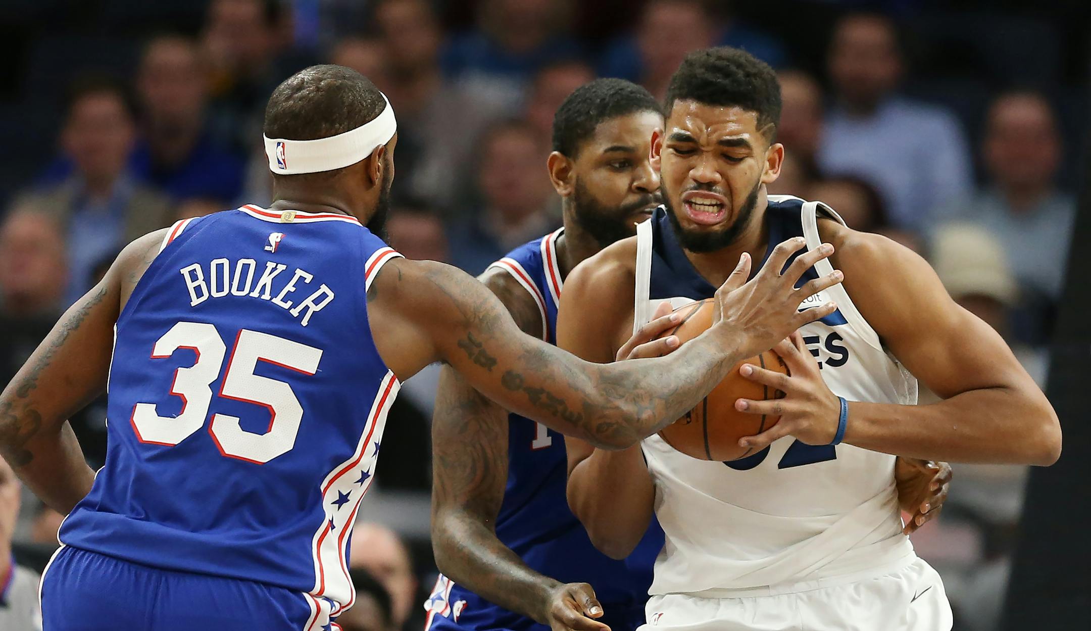 Philadelphia 76ers forward Trevor Booker (35) and teammate Amir Jonson put pressure on Minnesota Timberwolves center Karl-Anthony Towns (32) during NBA action at Target Center Tuesday December 12, 2017 in Minneapolis, MN.] The Minnesota Timberwolves hosted the Philadelphia 76ers at Target Center. JERRY HOLT � jerry.holt@startribune.com