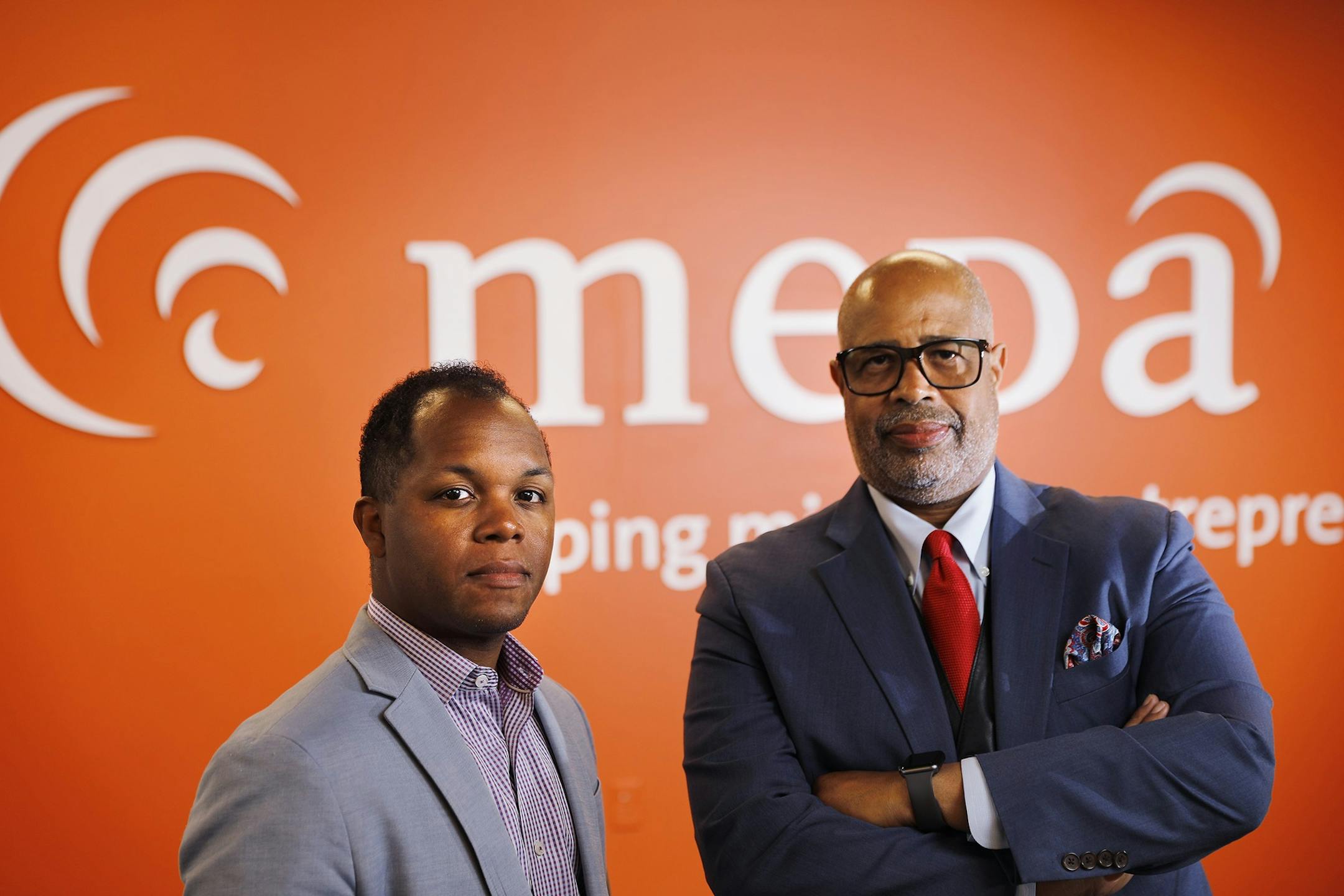 Meda CEO Gary Cunningham, right, poses for a photo with Jashan Eison, CEO of H&B Elevators.