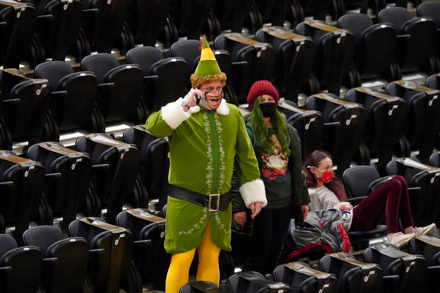 A Utah Jazz fan shows his Christmas spirit before an NBA basketball game against the Minnesota Timberwolves Saturday, Dec. 26, 2020, in Salt Lake City. (AP Photo/Rick Bowmer)