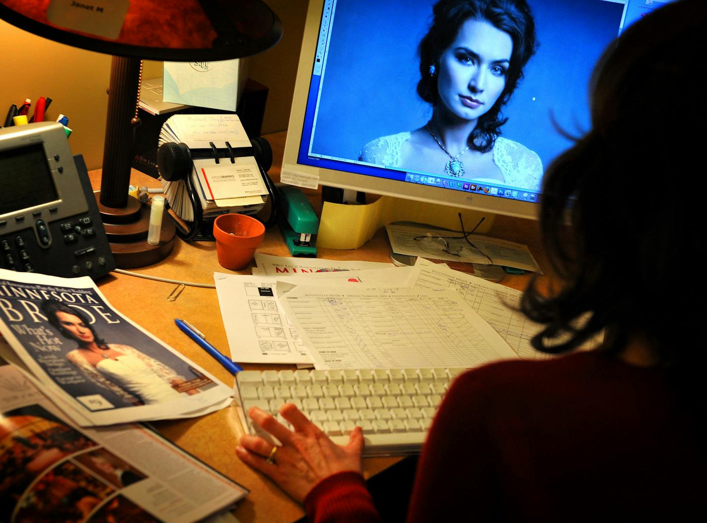 Tiger Oak Media, publisher of Minnesota Bride, filed for bankruptcy. Shown is a file photo of an employee working on the magazine. (GLEN STUBBE/Star Tribune)