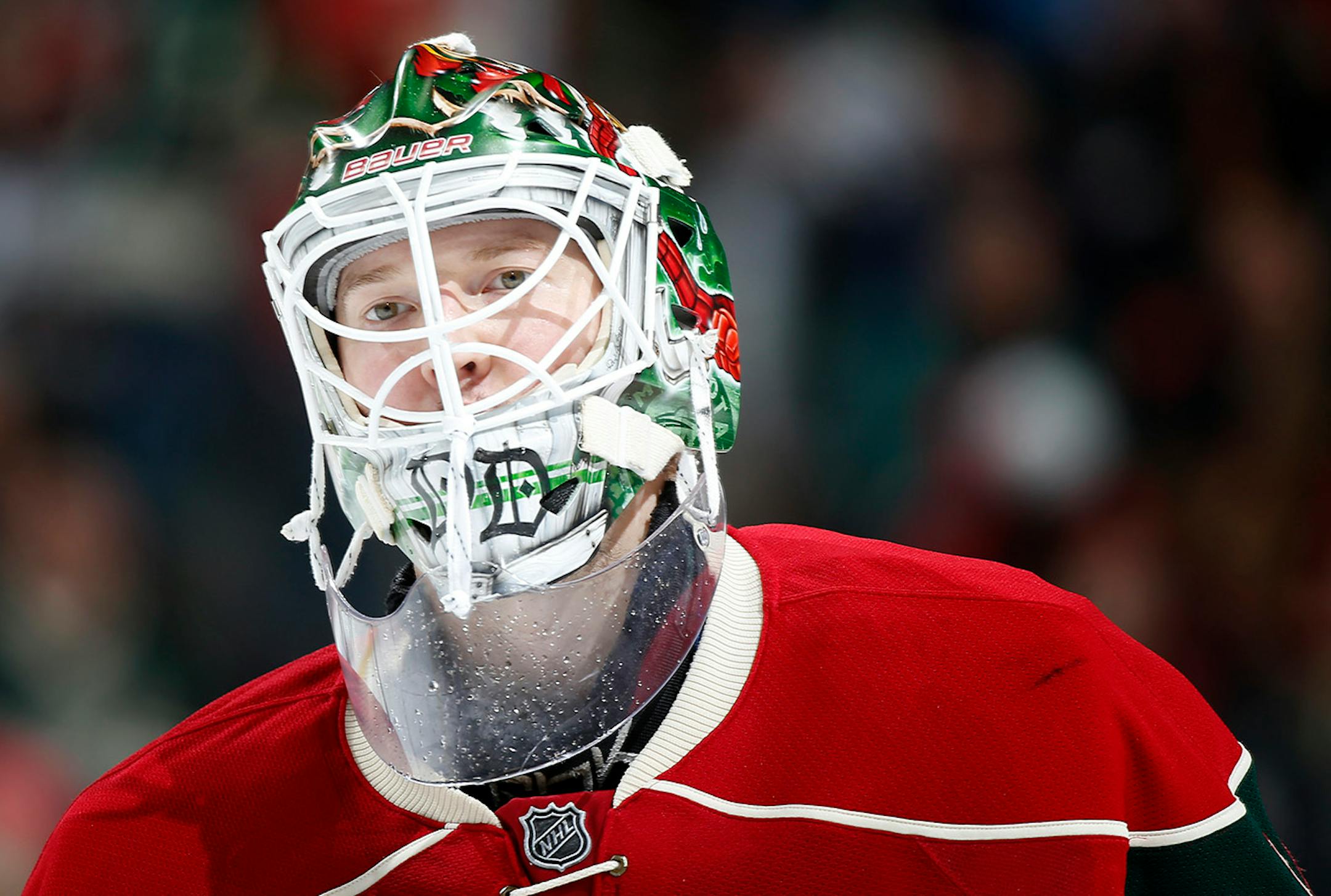 Minnesota Wild goalie Devon Dubnyk skated back to the bench during a timeout in the second period.