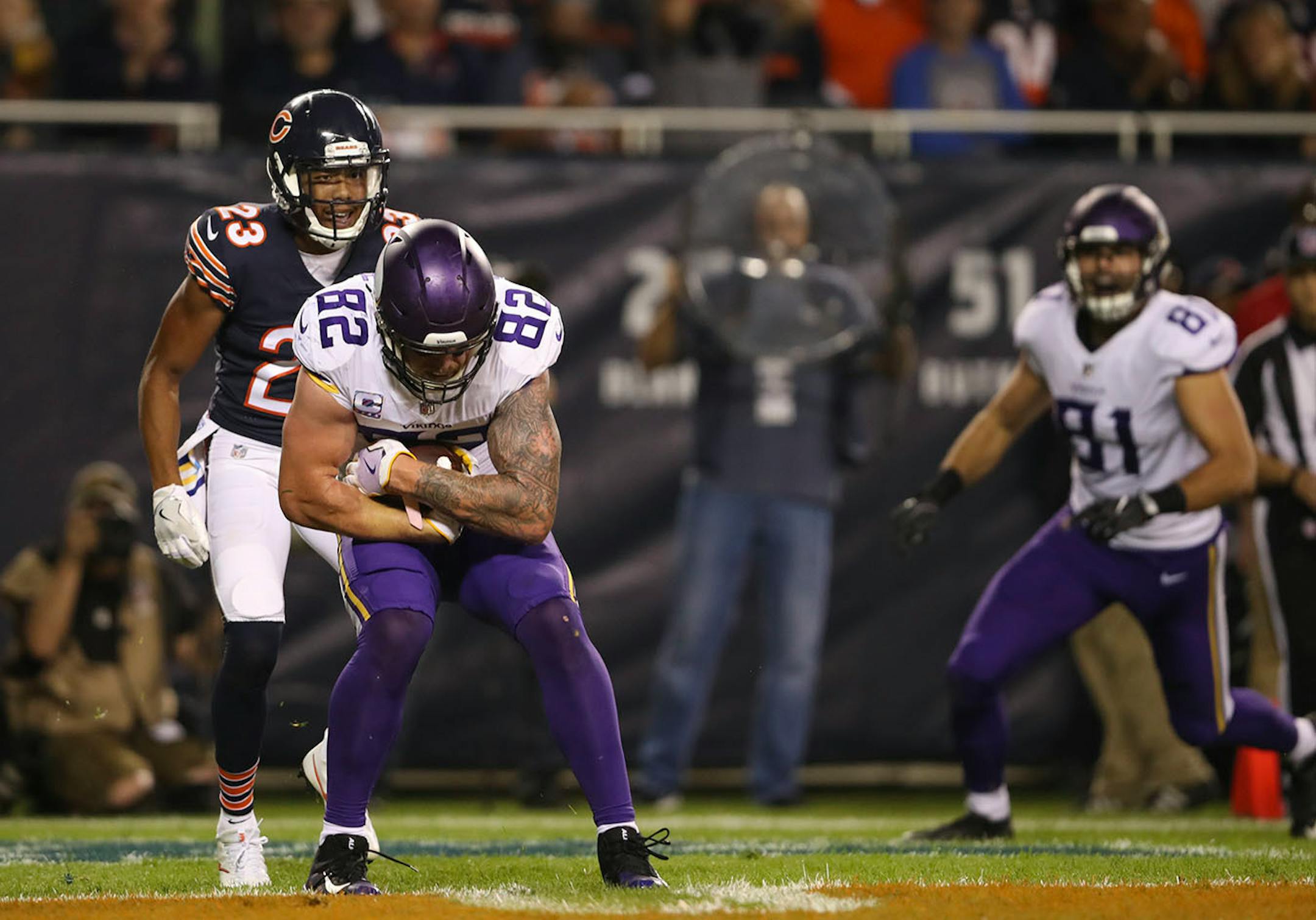 Minnesota Vikings tight end Kyle Rudolph (82) covered up the ball after his 13 yard touchdown reception in the third quarter. ] JEFF WHEELER ï jeff.wheeler@startribune.com The Minnesota Vikings beat the Chicago Bears 20-17 in an NFL Monday Night Football game on October 9, 2017 at Soldier Field in Chicago.