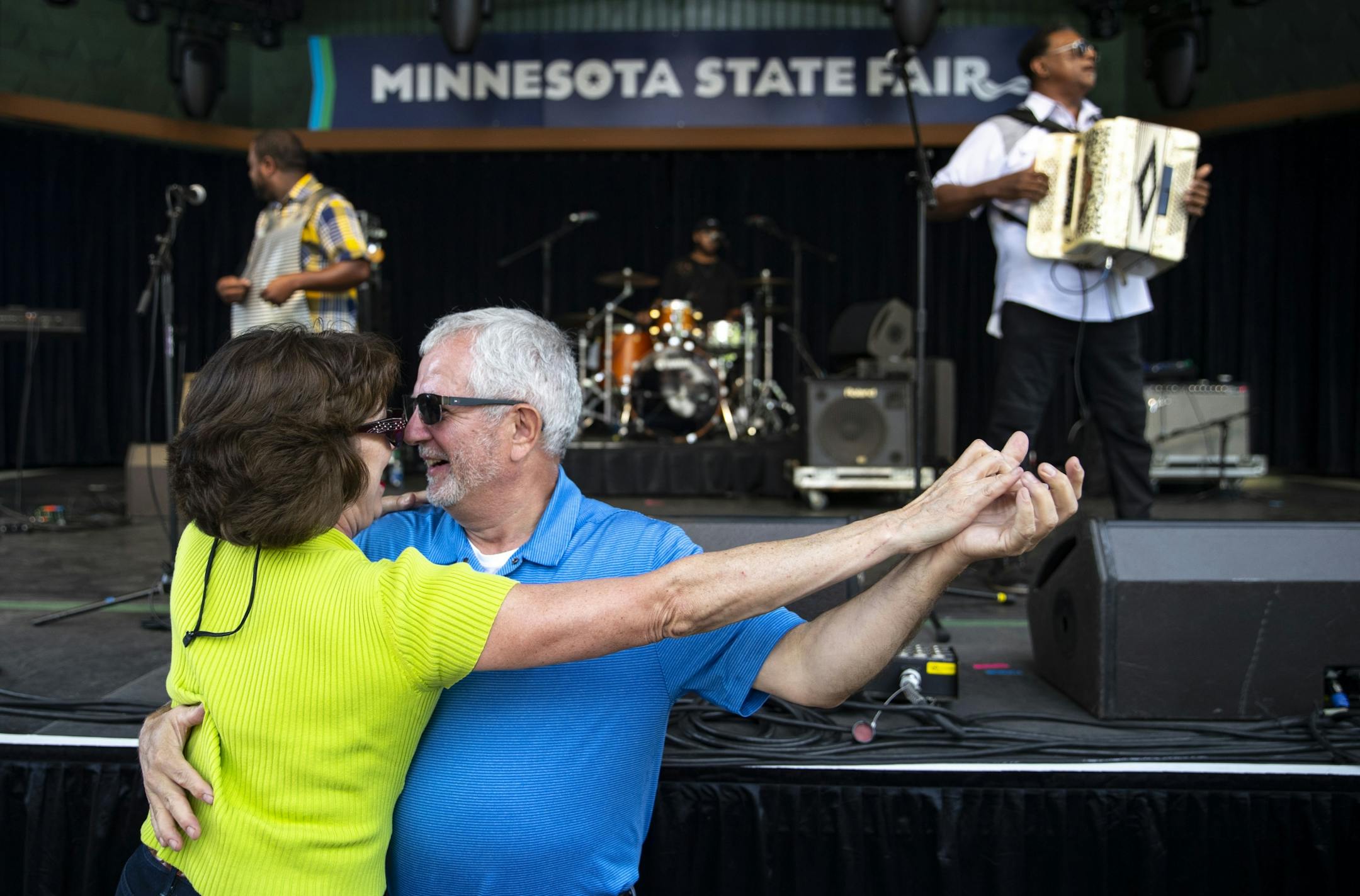 (Left) Nancy Erickson and Mark Behling danced to the music of Chubby Carrier & the Bayou Swamp Band during their set at Leinie Bandshell at the Minnesota State Fair on Friday August 23, 2019.