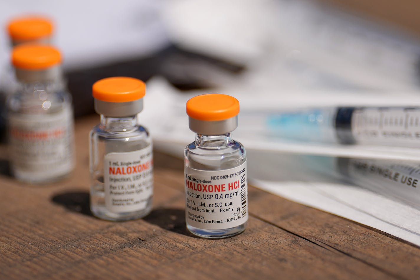 Bottles of naloxone sit out during an overdose training session.