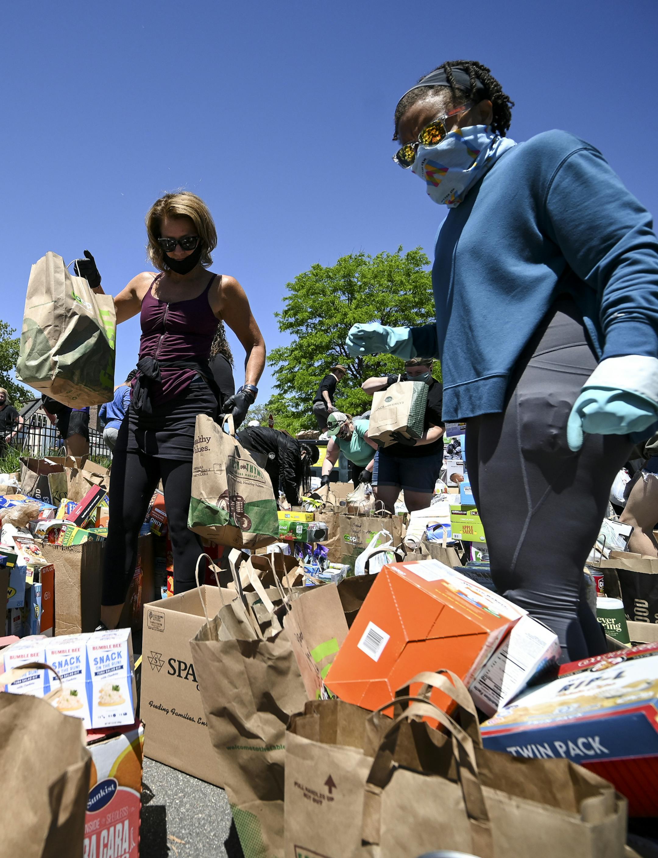 Dozens of volunteers processed donated items outside US Bank on West Broadway. ] aaron.lavinsky@startribune.com Protests continued in the wake of George Floyd's death in police custody on Saturday, May 30, 2020 in Minneapolis, Minn.