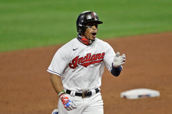 Cleveland's Francisco Lindor reacts as he runs the bases after hitting a two-run home run in the sixth inning i