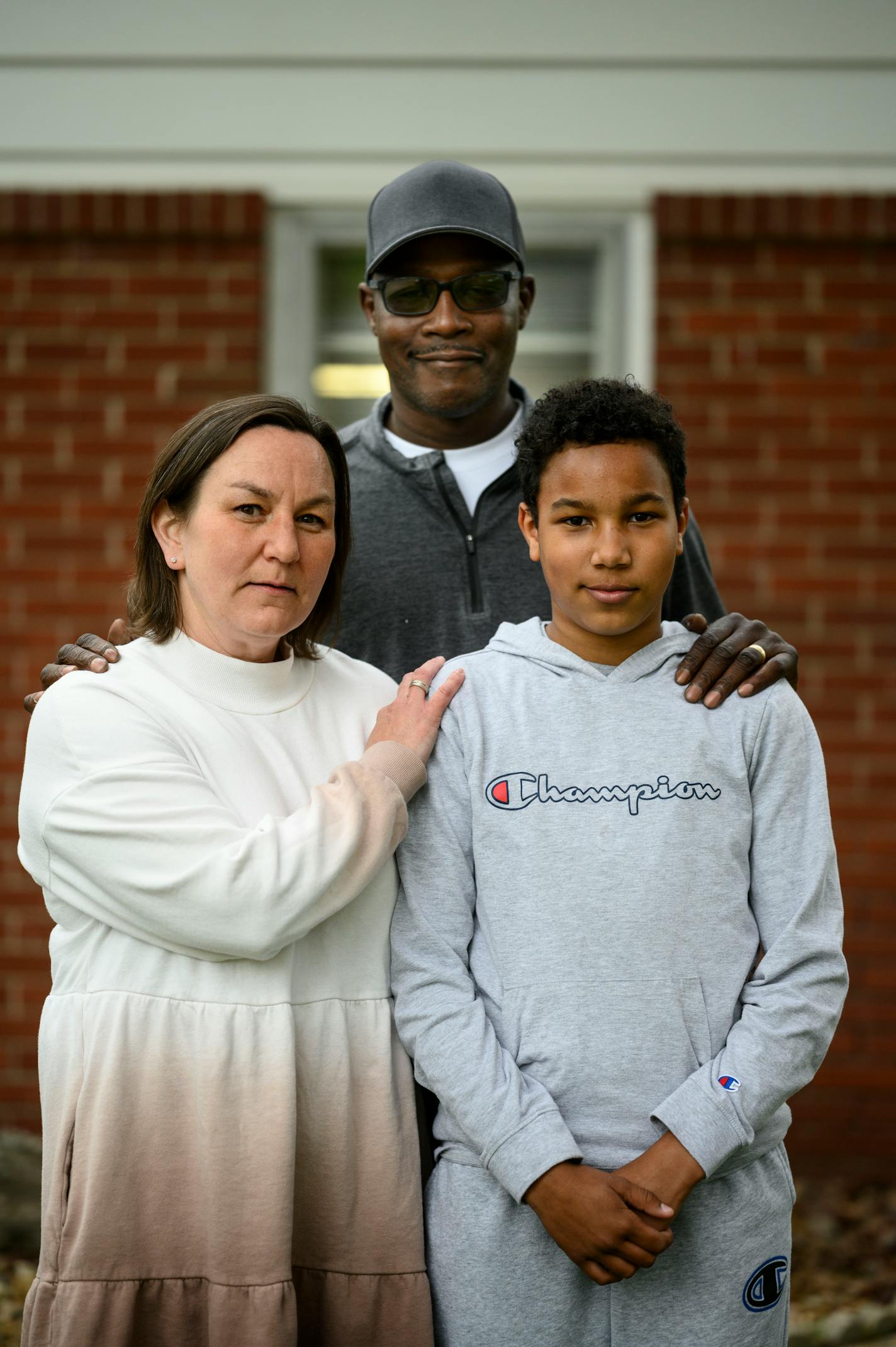 Kelly Drummer, executive director of Migizi with her husband, Samuel and youngest son, Solomon.