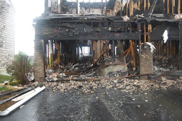 Chaska Fire Department photo: Heat and flames quickly consumed this large house in Chaska in May and singed nearby homes. The Chaska department suppor