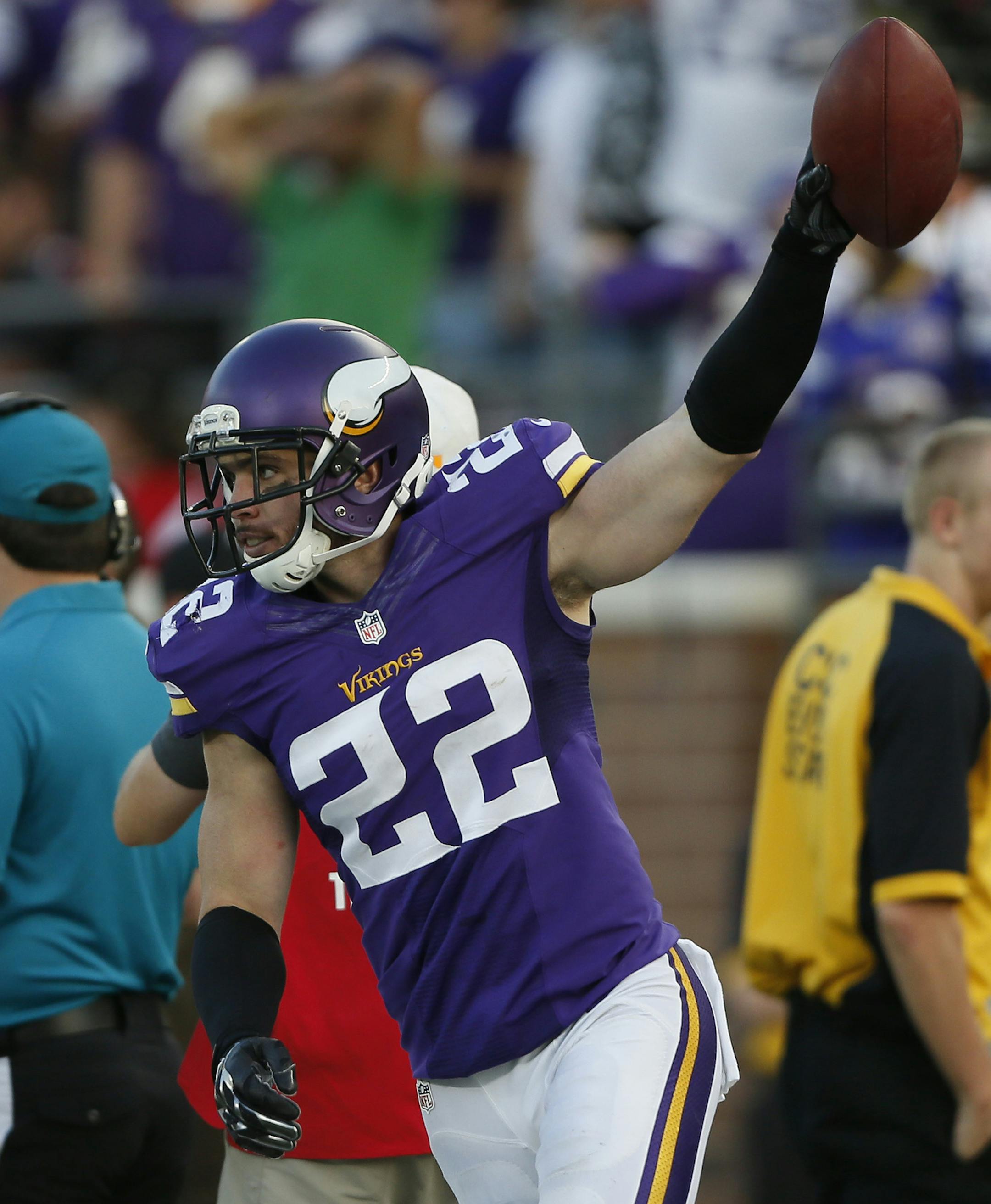 Minnesota Vikings free safety Harrison Smith (22) celebrated his fourth quarter interception .The Minnesota Vikings played the Atlanta Falcons at TCF Bank Stadium Sunday September 28 , 2014 in Minneapolis ,MN. ] Jerry Holt Jerry.holt@startribune.com