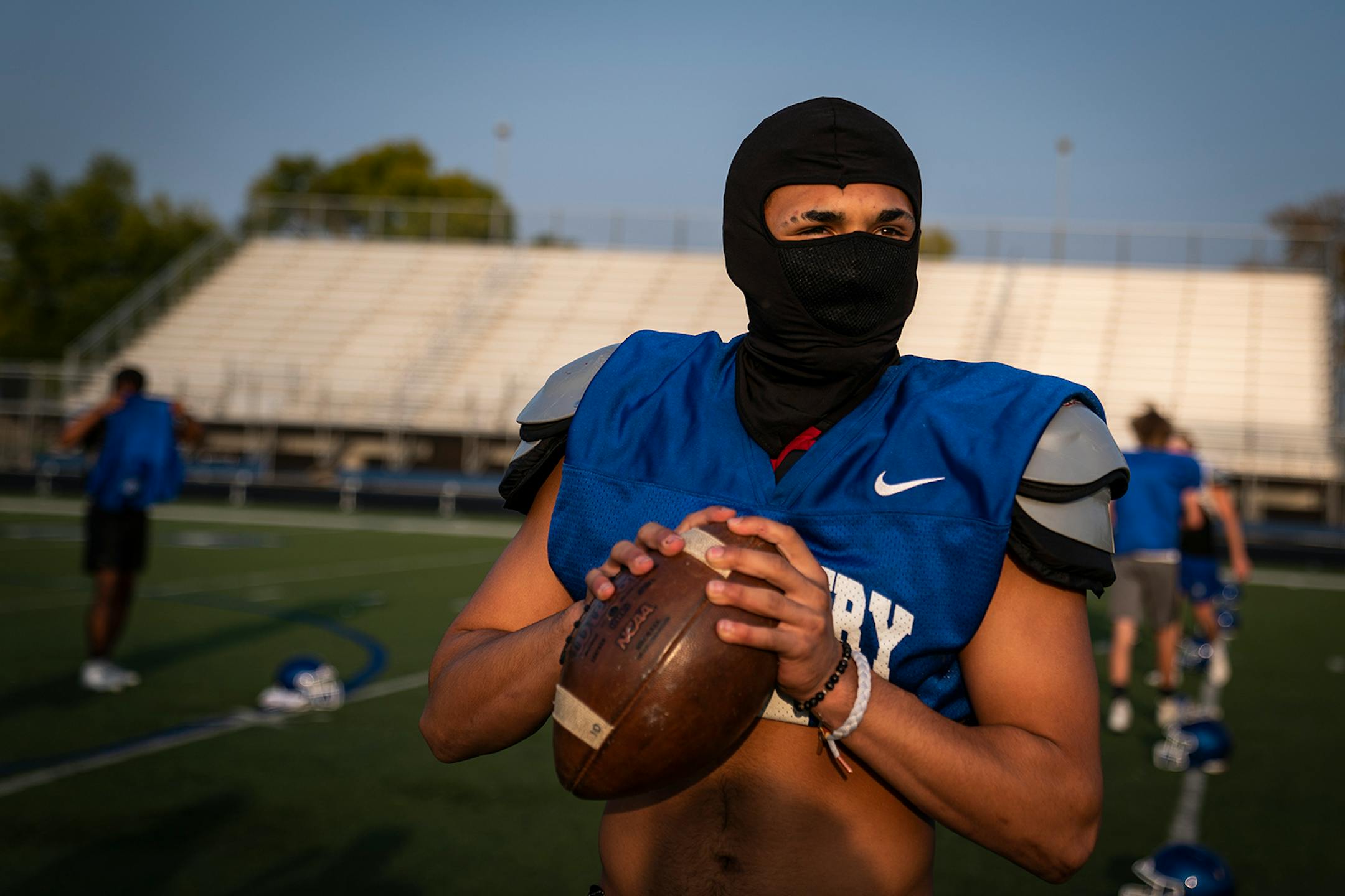 Linebacker Ahmed Abdelal warmed up during Woodbury High School football practice.