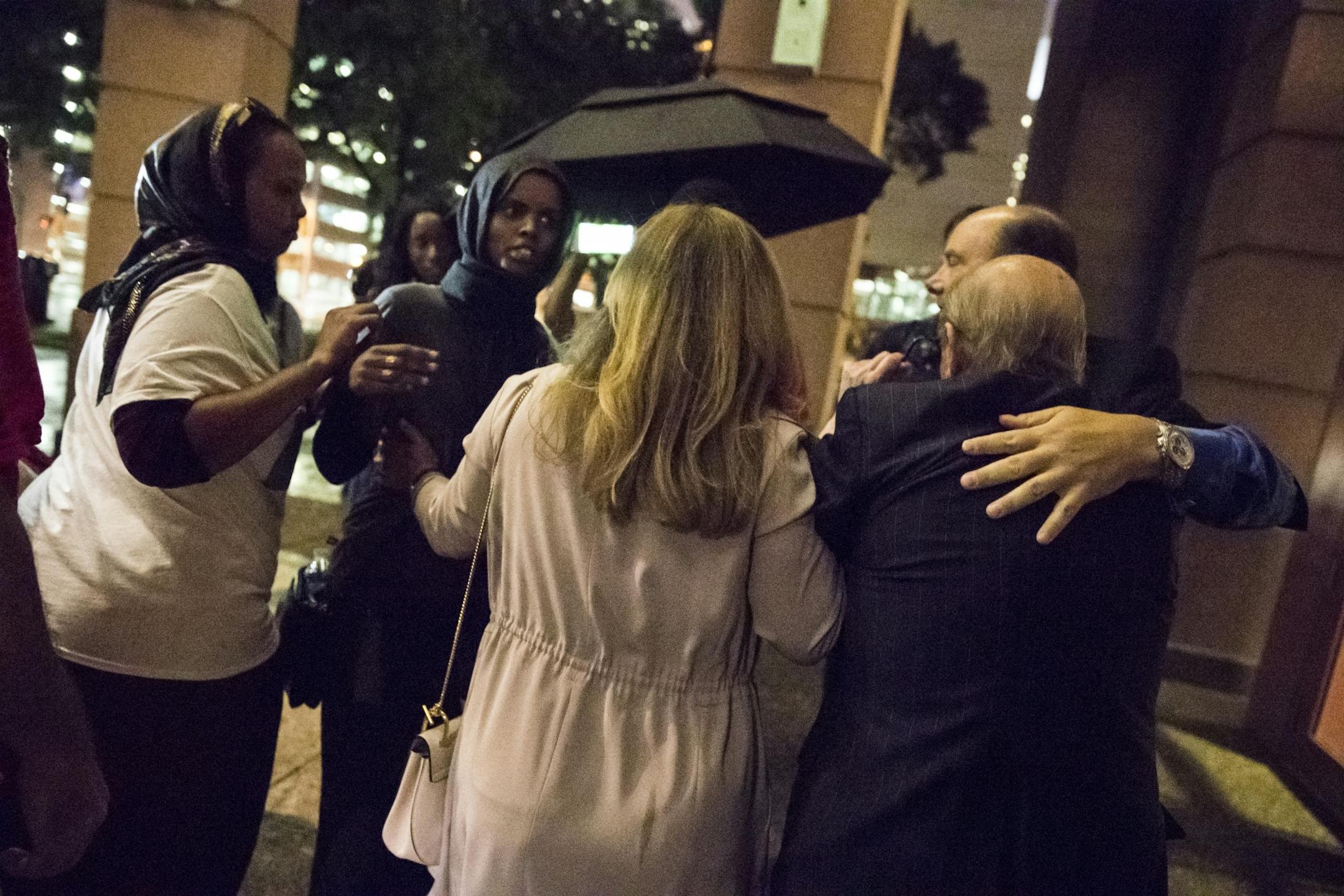 Trump supporters, right, were confronted by angry protesters as they left a fundraiser for Republican presidential candidate Donald Trump at the Minneapolis Convention Center on August 19.