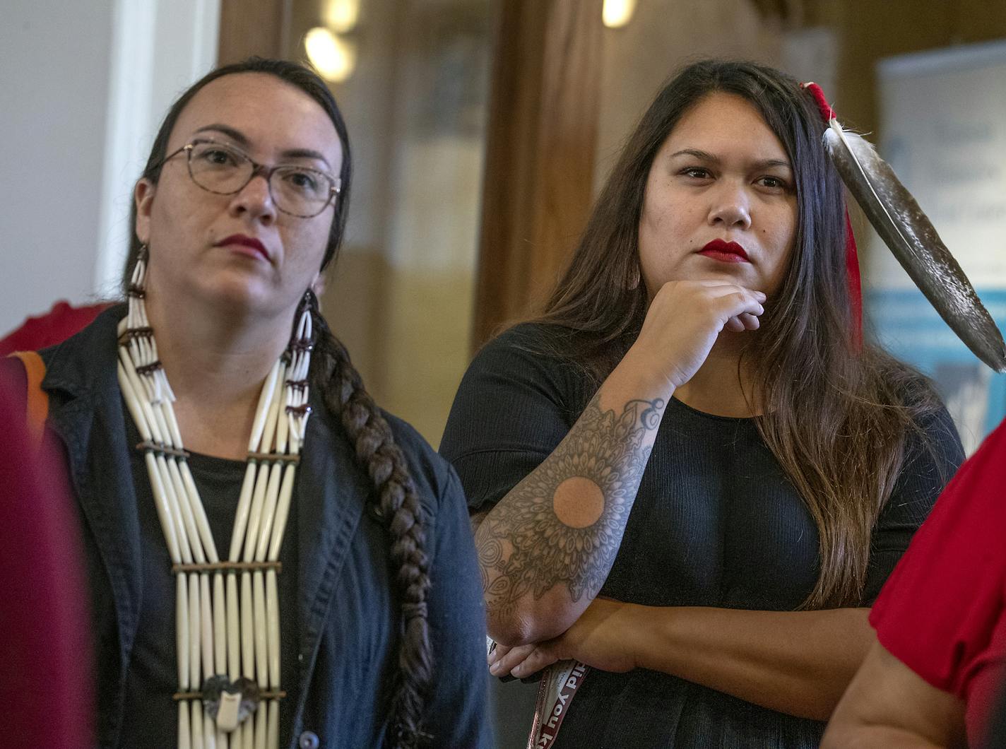 Autumn Dillie of the Turtle Mountain Indian Reservation of North Dakota, right, listened to emotional testimony by speakers during a ceremonial bill signing to launch the first official meeting of the MMIW Task Force, Thursday, September 19, 2019 in St. Paul, MN. ] ELIZABETH FLORES &#x2022; liz.flores@startribune.com