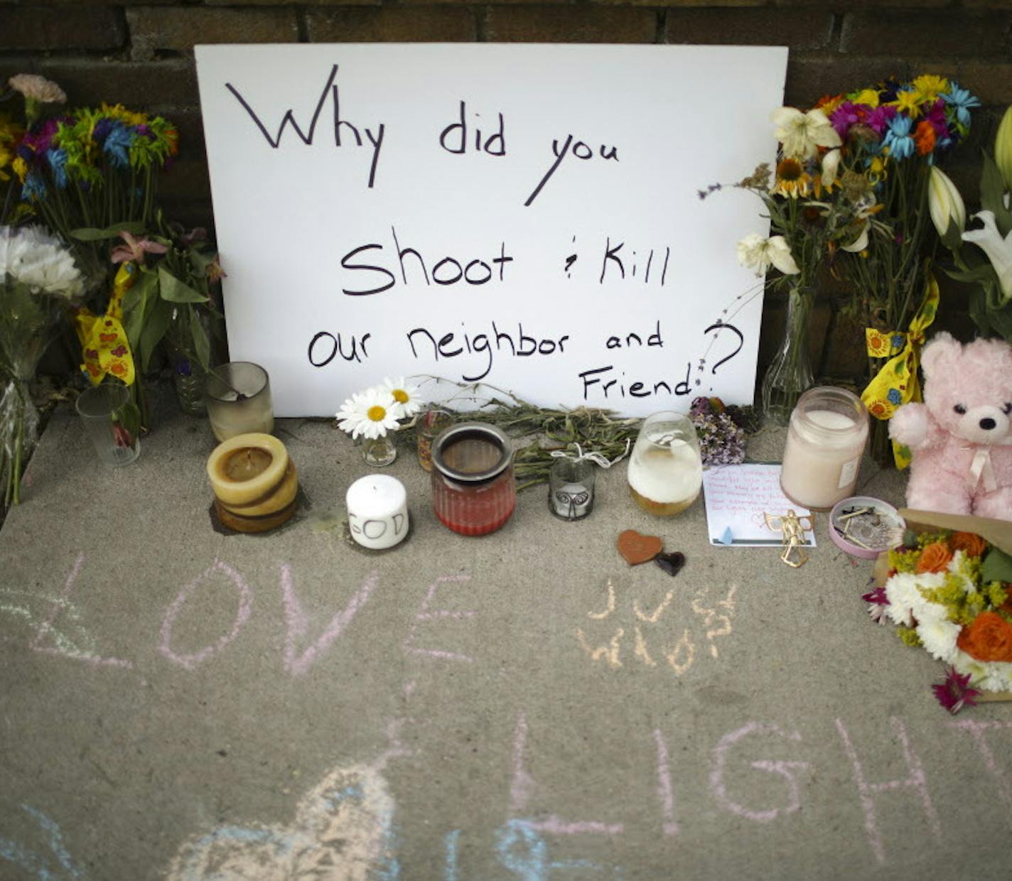 Detail of the larger memorial on the sidewalk on W. 51st. St. in the Fulton neighborhood. ] JEFF WHEELER &#xef; jeff.wheeler@startribune.com Friends and strangers continue to stop at the spot on W. 51st St. where a memorial is slowly growing for Justine Damond Monday night, July 17, 2017 in Minneapolis.