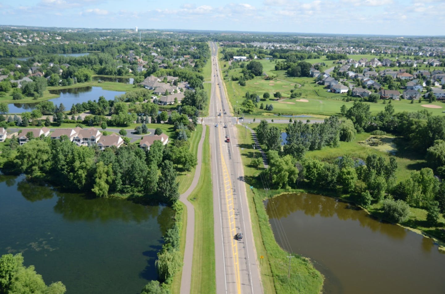 An aerial photo of Woodbury Drive, near its intersection with Lake Road. Woodbury charges developers a "major roadway assessment" fee to help cover road improvements outside of a subdivision.