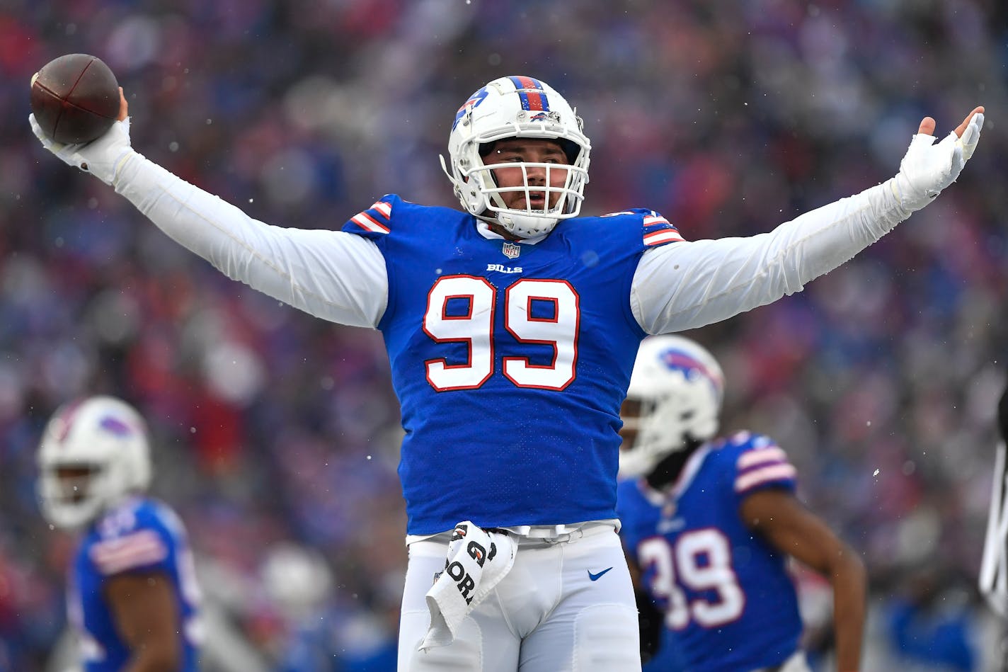 Buffalo Bills defensive tackle Harrison Phillips celebrates after recovering a fumble during the first half of an NFL football game against the Atlanta Falcons in Orchard Park, N.Y., Sunday, Jan. 2, 2022. (AP Photo/Adrian Kraus)