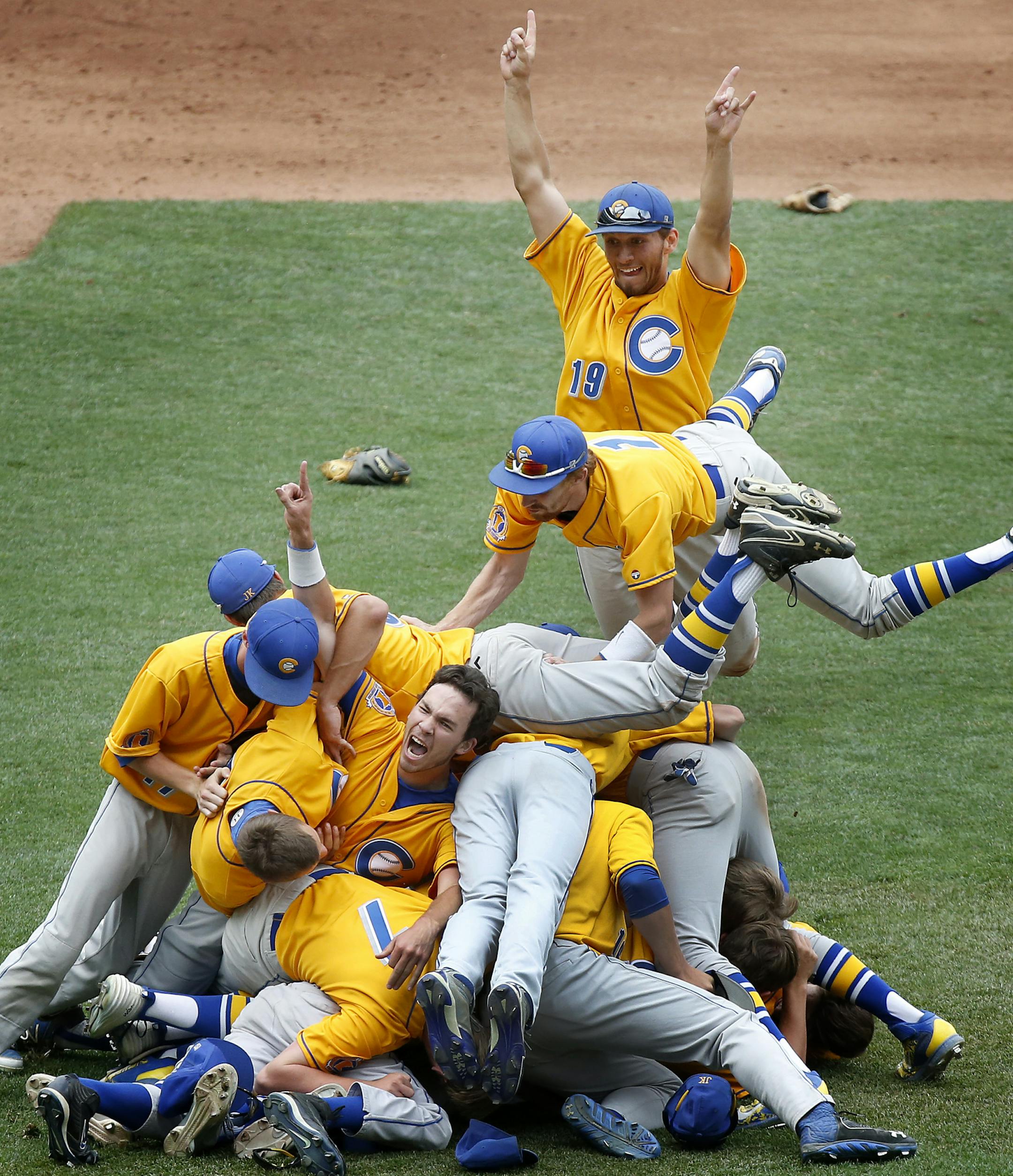 St. Cloud Cathedral players celebrated after winning the Class 2A championship. ] CARLOS GONZALEZ cgonzalez@startribune.com - June 15, 2015, Minneapolis, MN, Target Field, High School Prep Baseball Championships, Class 2A baseball championship, St. Cloud Cathedral vs. Minnehaha Academy