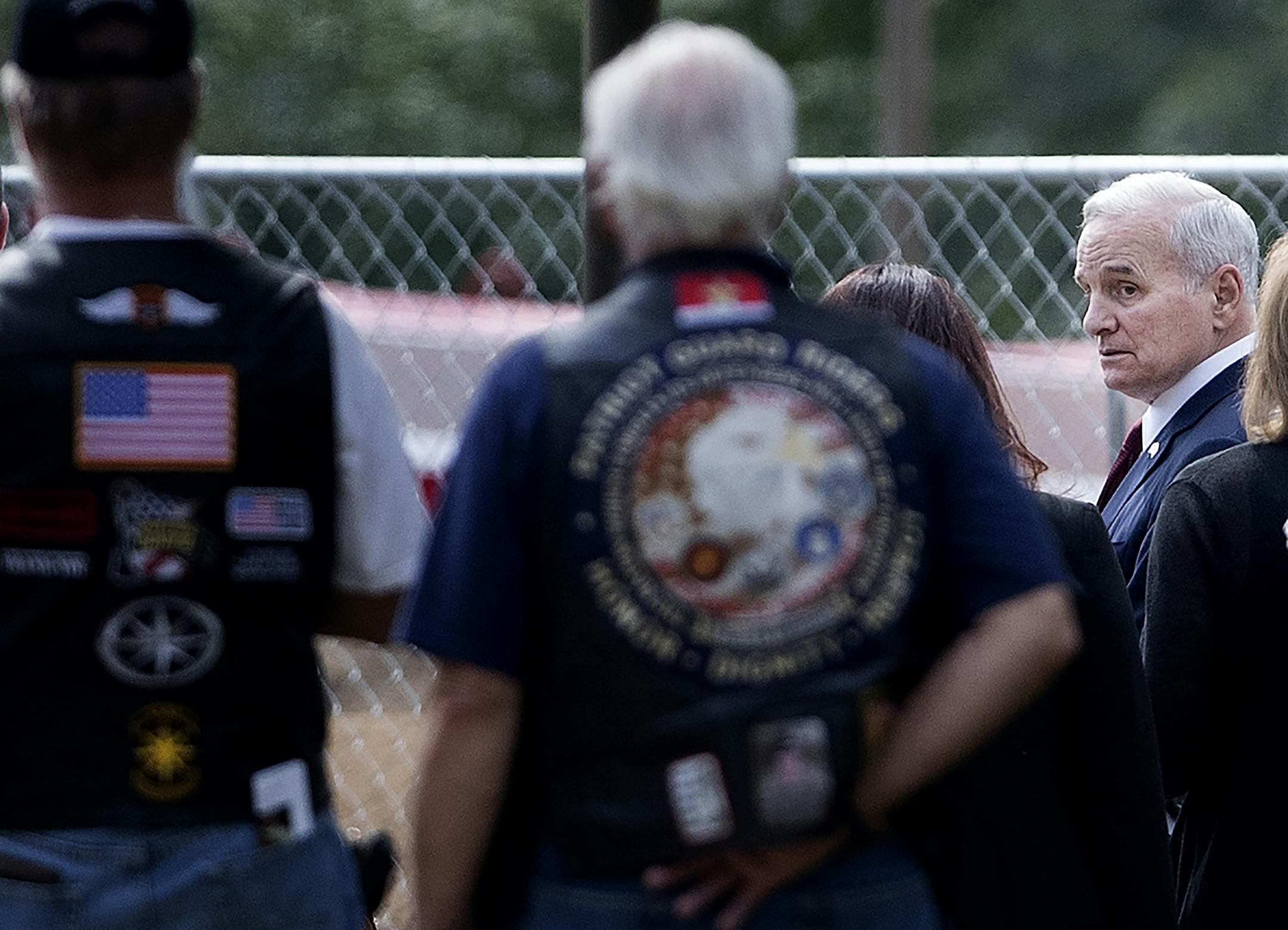 Minnesota Governor Mark Dayton leaving the funeral service for officer William Mathews at the Wayzata Free Church.