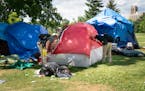 Police cleared a sprawling homeless encampment at Minneapolis' Powderhorn Park, which had swelled to several hundred people, citing increasing crime a