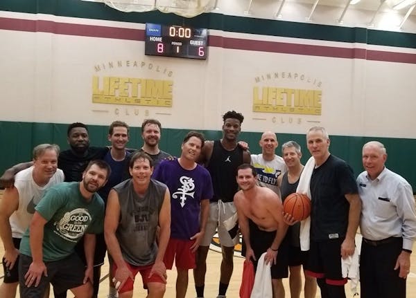 Jimmy Butler won't play for Wolves, but he played a basketball game in Minneapolis