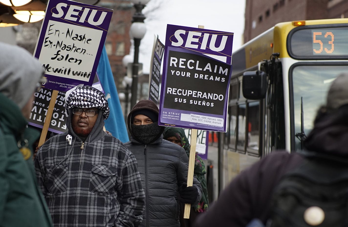 At the Securian Center in downtown St. Paul, several dozen janitors from the SEIU protested their wages .] Richard Tsong-Taatarii/rtsong-taatarii@startribune.com