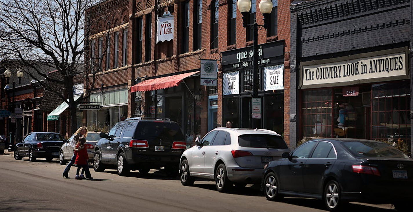 Cars parked on Excelsior's Water Street.