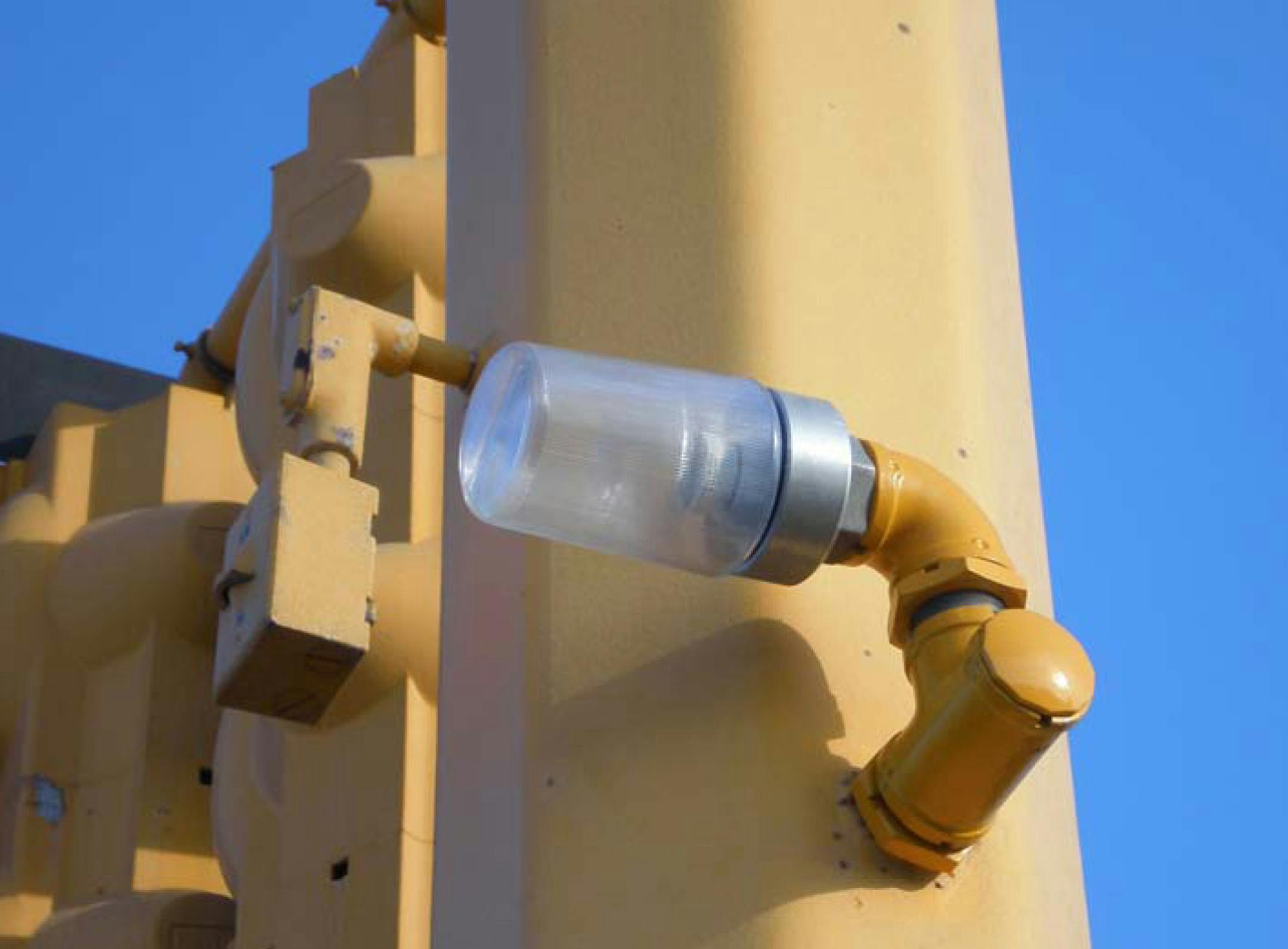 The Minnesota Dept. of Transportation and the City of Burnsville have new enforcement lights on traffic signal poles at two busy Highway 13 intersections to catch red-light runners and stop crashes. The lights glow blue when the traffic signal turns red and are more easily seen by police parked nearby. (4/2008) MN/DOT photo.