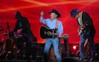 Texas giant George Strait heats up Minneapolis with help from ace-in-the-hole Chris Stapleton