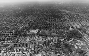 A view of Tangletown from above in the 1920s. The neighborhood's old water tower stands in the bottom left.