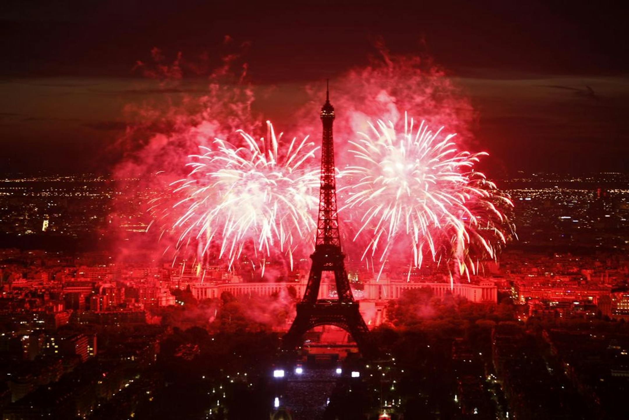 Fireworks illuminate the Eiffel Tower in Paris during Bastille Day celebrations late Thursday, July 14, 2011.