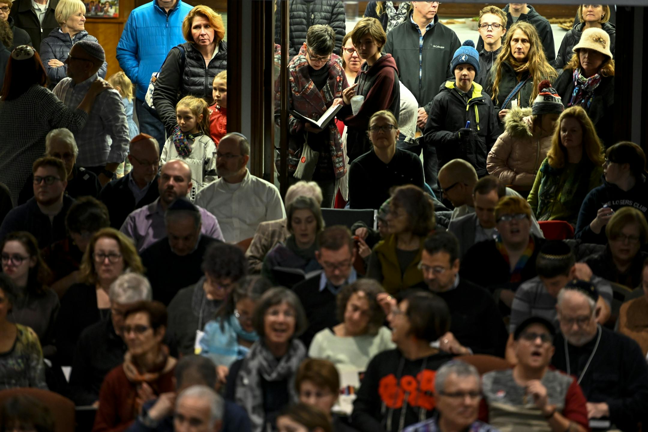 Hundreds of temple goers attended Friday night services at Shir Tikvah. They synagogue ran out of prayerbooks and the sanctuary had to be extended into an overflow area.