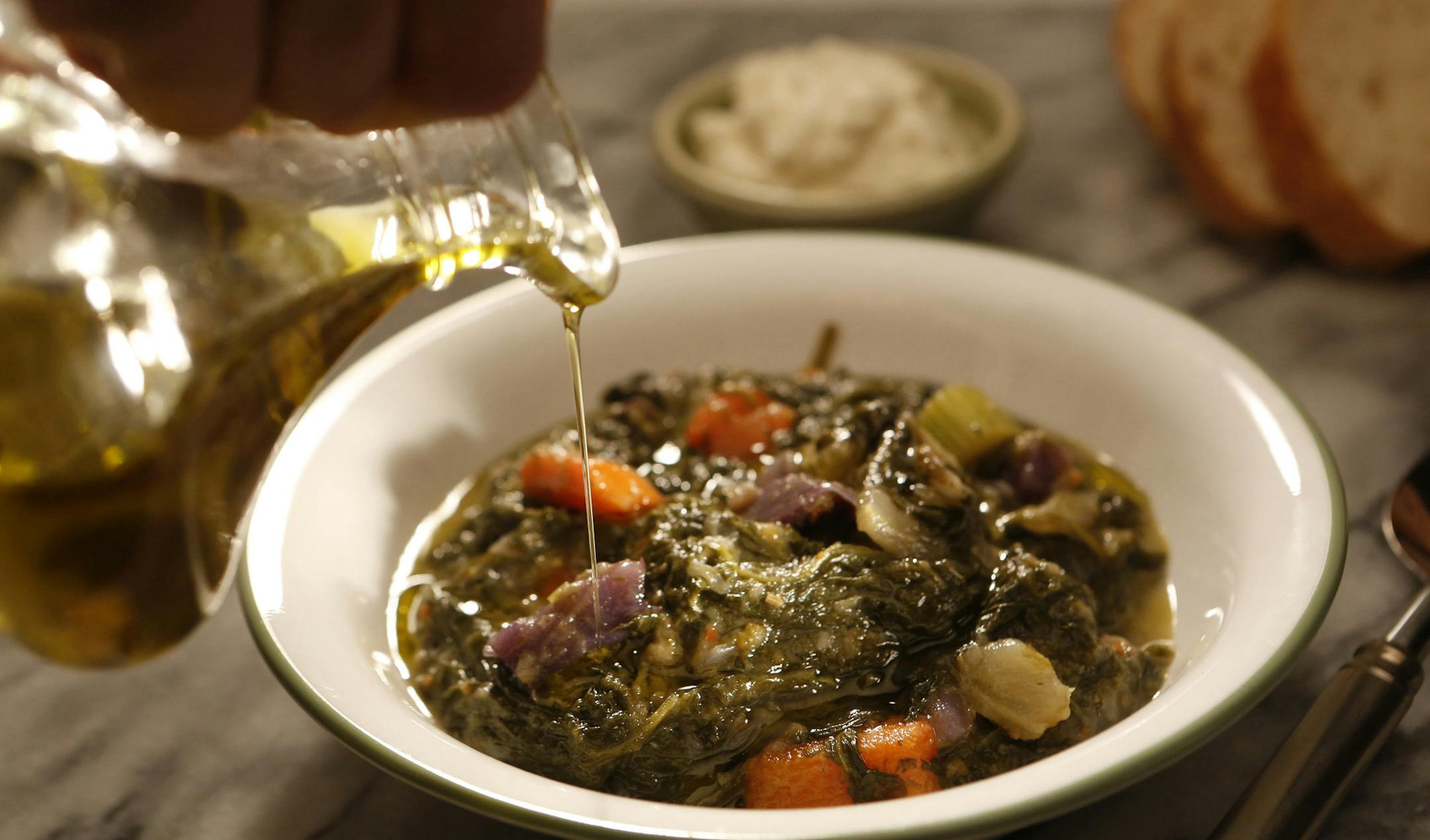 Soups are perfect this time of year. Try this Braised Greens and Potatoes with Lemon and Fennel. (Anne Cusack/Los Angeles Times)