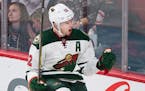 Minnesota Wild's Eric Staal celebrates after scoring against the Montreal Canadiens during third-period NHL hockey game action in Montreal, Thursday, 