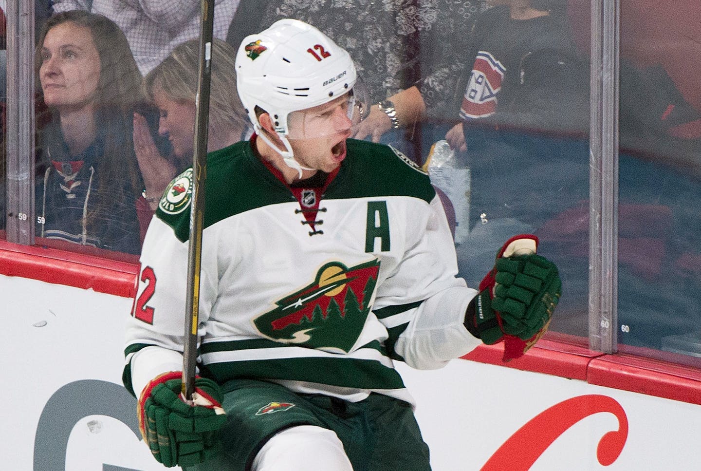 Minnesota Wild's Eric Staal celebrates after scoring against the Montreal Canadiens during third-period NHL hockey game action in Montreal, Thursday, Dec. 22, 2016. (Graham Hughes/The Canadian Press via AP)