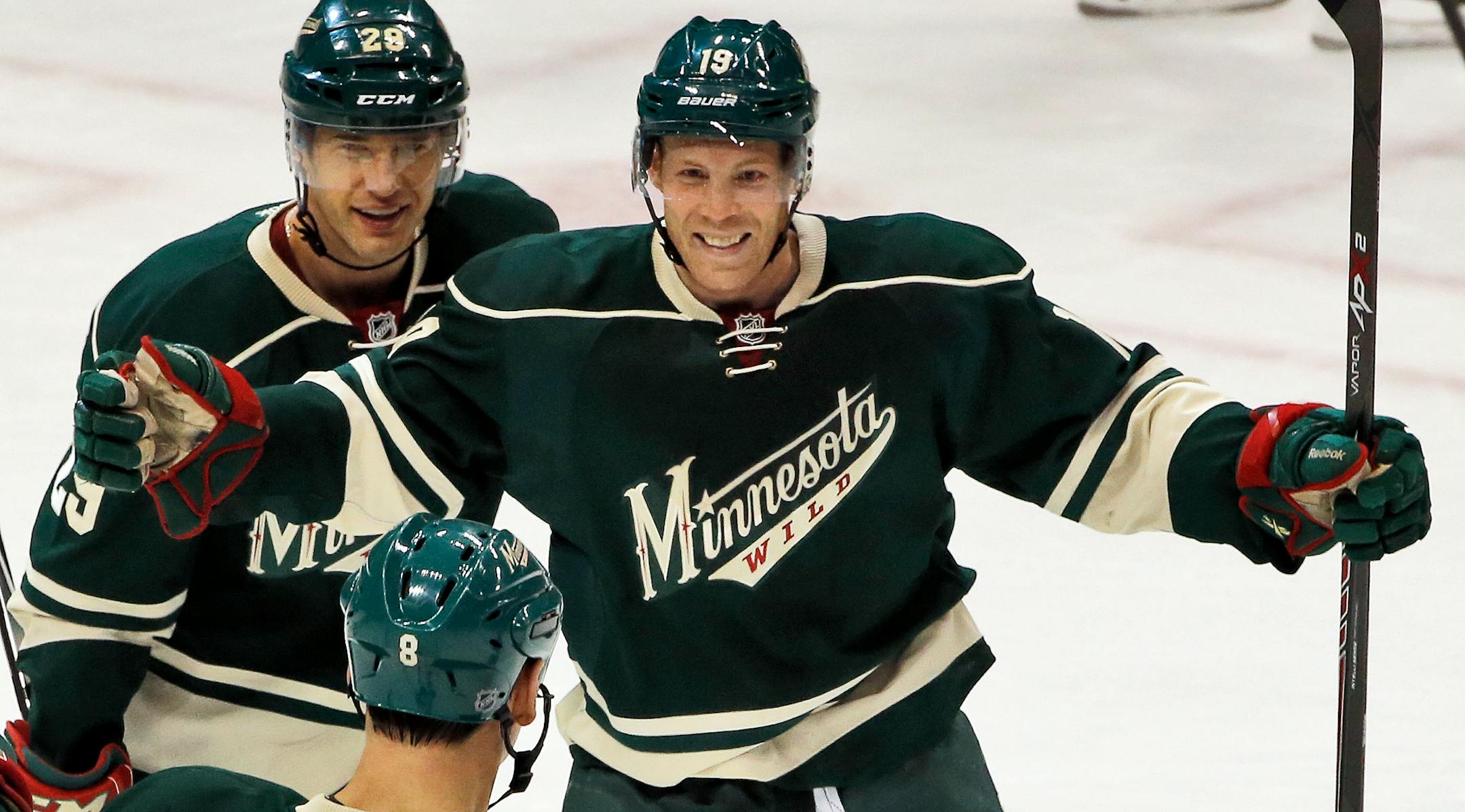 The Wild's Stephane Veilleux, right, celebrated his goal against Pittsburgh on Saturday. Cody McCormick, foreground, assisted on the goal.