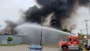 Minneapolis firefighters doused a large fire that torched a pawnshop early Friday morning just south of the Cedar-Riverside intersection.