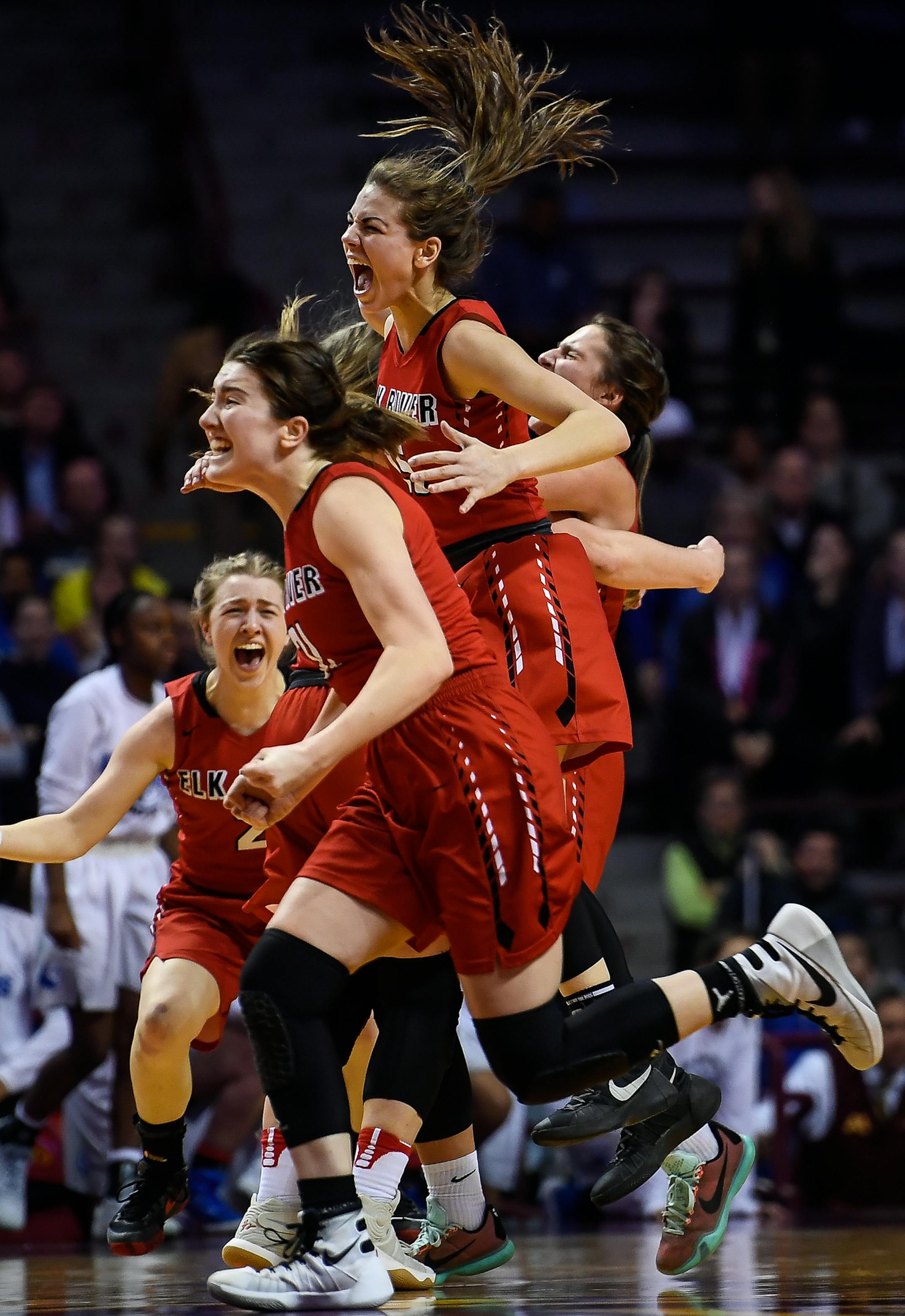 Elk River players celebrated their 64-60 4A championship win over Hopkins. ] AARON LAVINSKY &#xef; aaron.lavinsky@startribune.com Elk River played Hopkins in the Class 4A girls' basketball championship game on Saturday, March 18, 2017 at Williams Arena in Minneapolis, Minn.