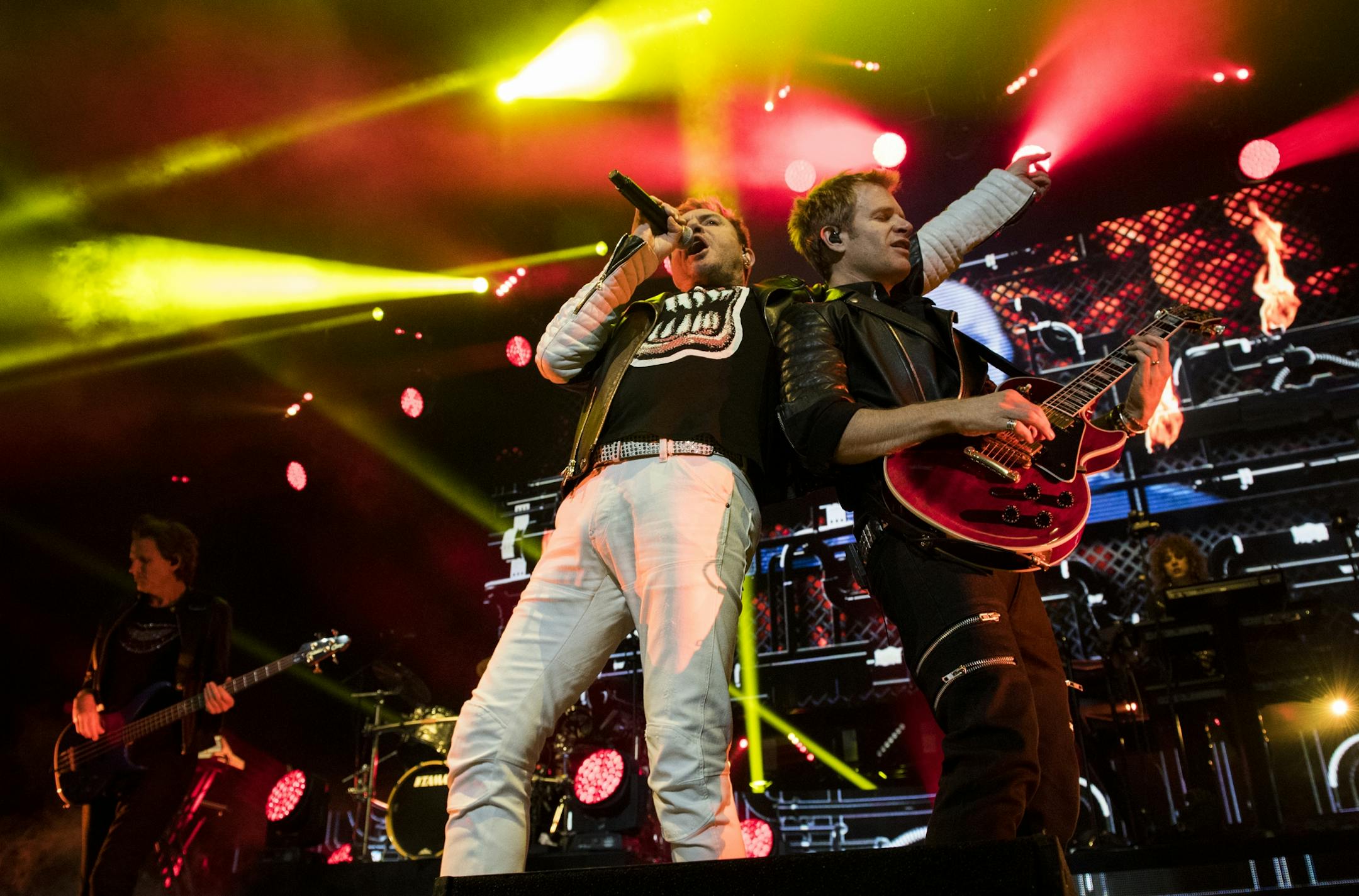 Simon Le Bon and Dominic Brown performed together as they played with the rest of Duran Duran at the Xcel Energy Center on Saturday night.