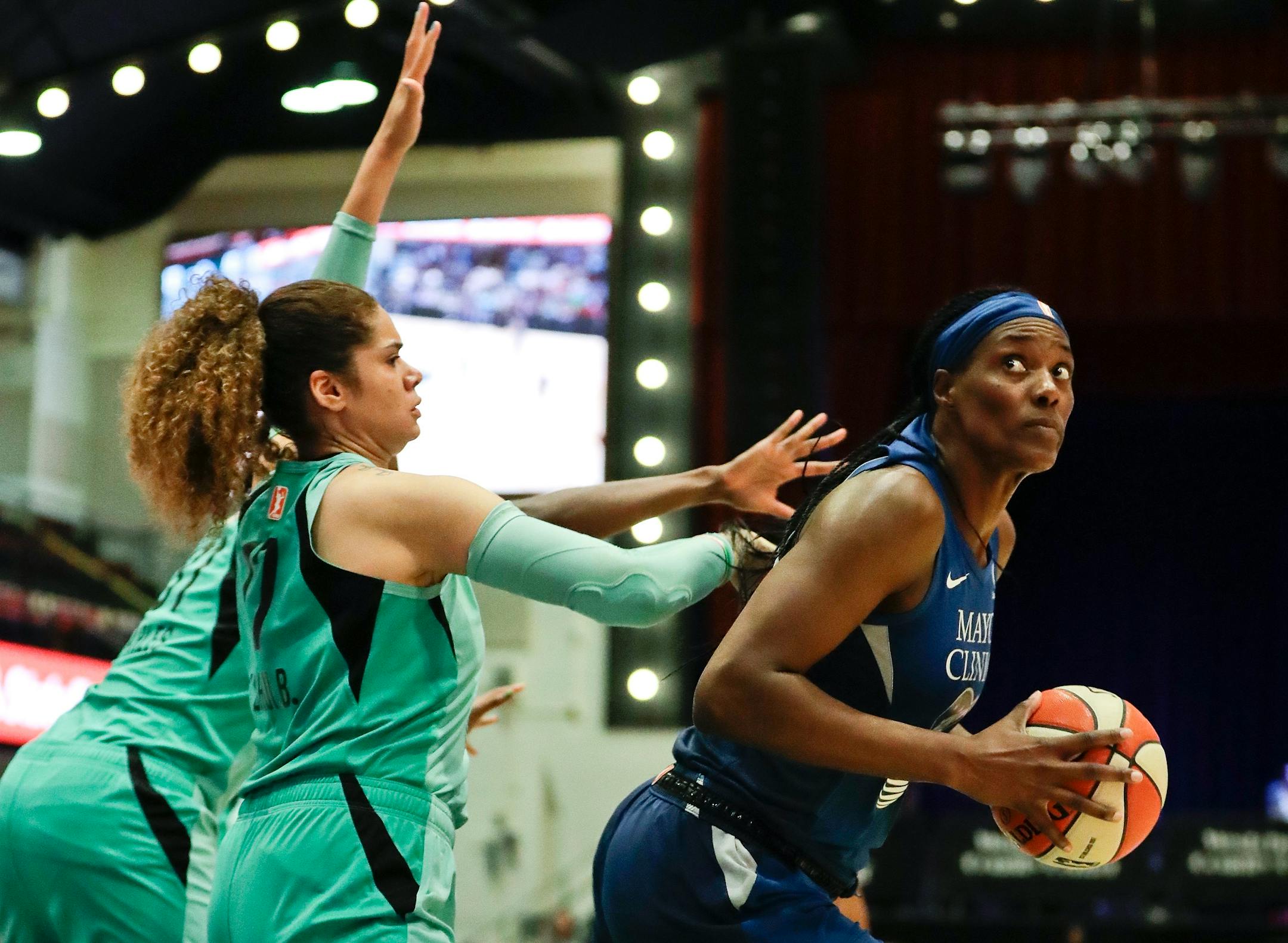 New York Liberty's Amanda Zahui B., left, defends against Minnesota Lynx's Sylvia Fowles during the second half