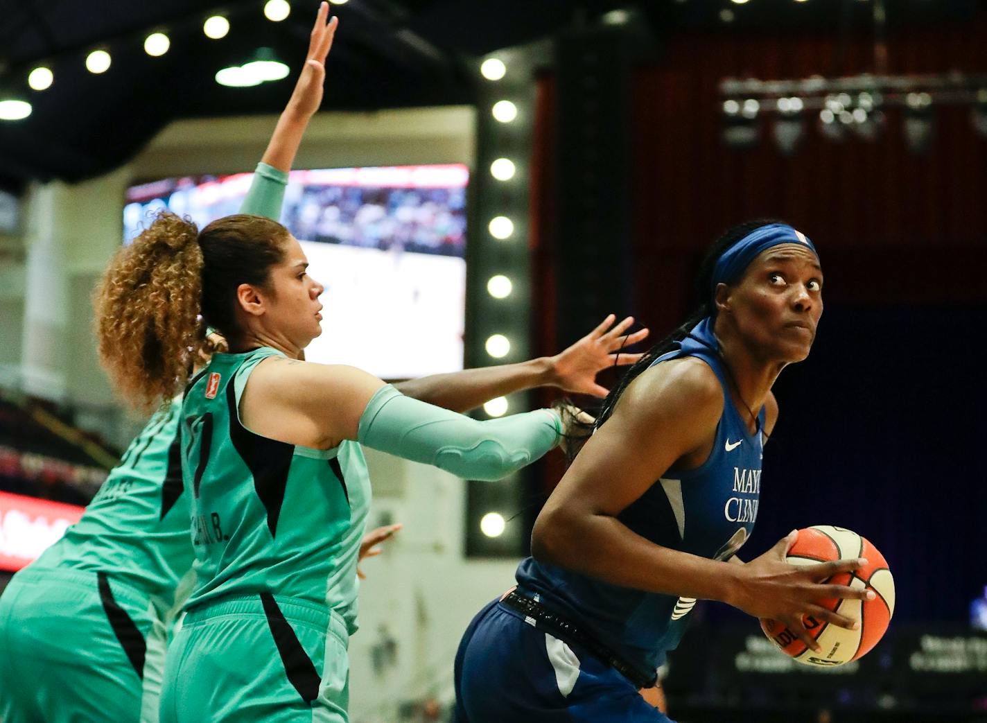 New York Liberty's Amanda Zahui B., left, defends against Minnesota Lynx's Sylvia Fowles during the second half