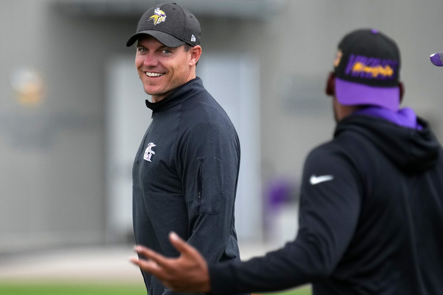 Minnesota Vikings head coach Kevin O'Connell jokes with his staff during training camp Thursday, July 28, 2022 at the TCO Performance Center in Eagan, Minn. ] ANTHONY SOUFFLE • anthony.souffle@startribune.com