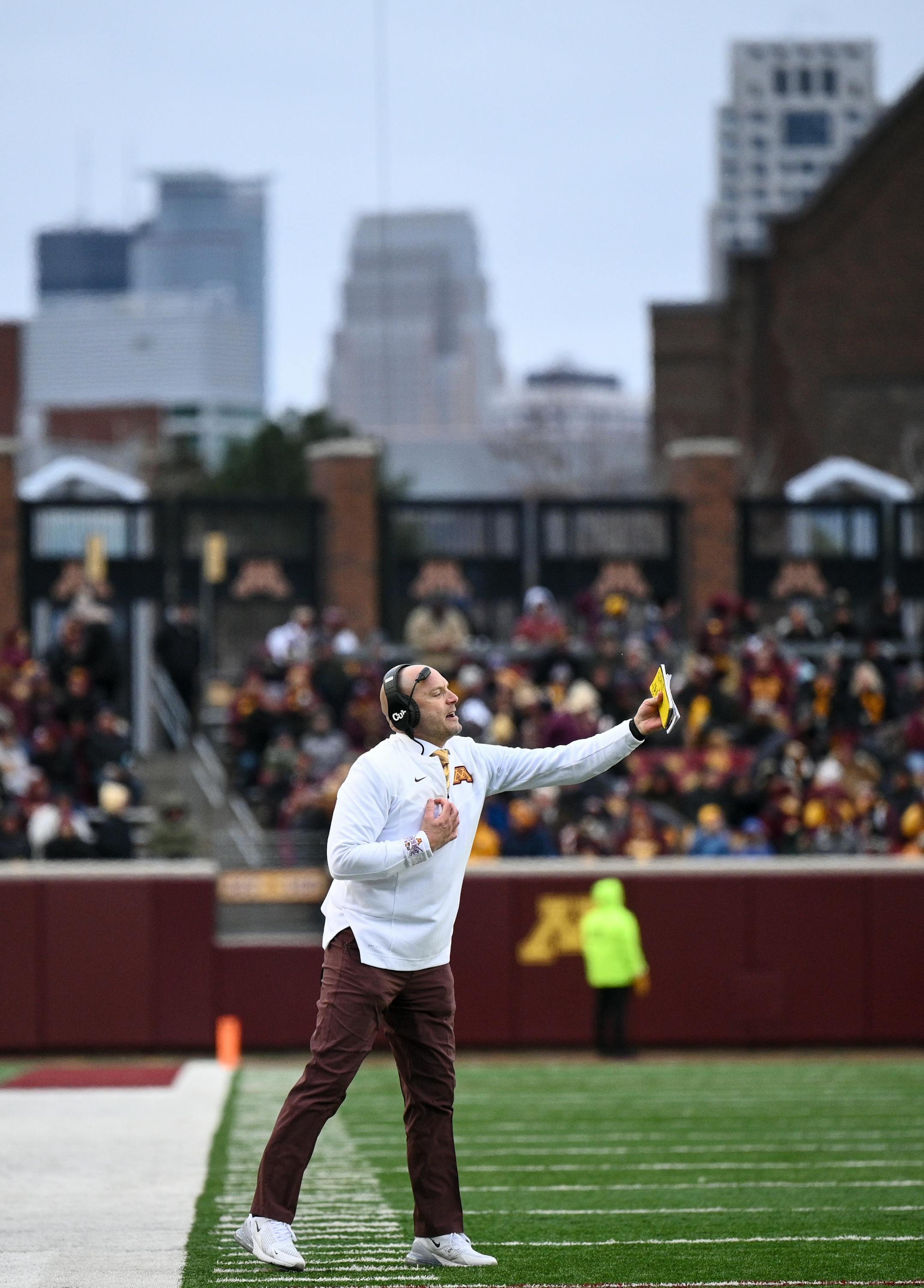 Minnesota Gophers head coach P.J. Fleck directs the team during the first half.