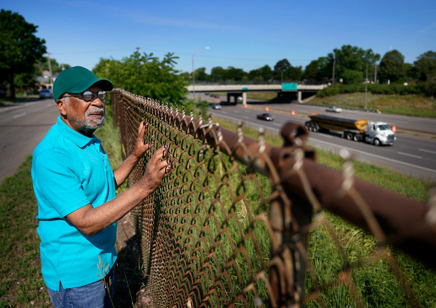 Minnesota legislators approved $6.2 million for a proposed Rondo land bridge over I-94. This is a major milestone for a project the Rondo community has wanted for years. Here, Rondo resident and community organizer Marvin Anderson, whose home and family business were destroyed in the 1960s when the freeway system came into the Twin Cities, looked out at I-94, near the Rondo Commemorative Plaza where the proposed land bridge will go and seen Friday in St. Paul. ]