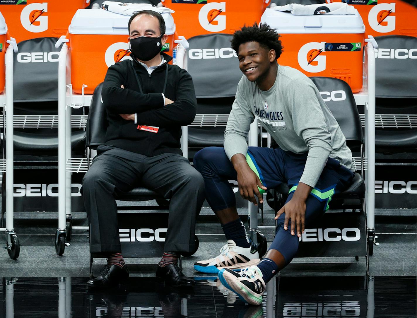 The Minnesota Timberwolves' President of Basketball Operations Gersson Rosas, left, and Anthony Edwards